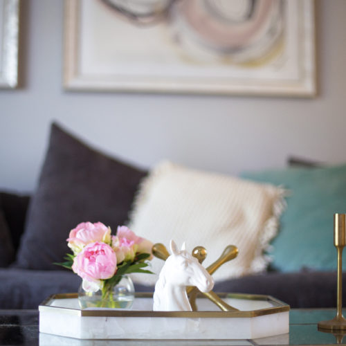 Glitter & Gingham's Living Room // Minted Art, Z Gallerie Couch, World Market Pillows, Homegoods Coffee Table